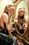 aira boots cosplay default_costume detached_sleeves dress headset megurine_luka mirror pink_hair sleeveless_blouse thighhighs vocaloid rating:Safe score:2 user:lolzin