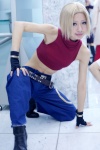blonde_hair blue_mary boots cosplay croptop fingerless_gloves gloves hyuuga king_of_fighters midriff trousers turtleneck rating:Safe score:0 user:nil!