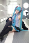 aqua_hair blouse cosplay detached_sleeves hatsune_miku headset mashiro_yuki pleated_skirt skirt thighhighs tie twintails vocaloid zettai_ryouiki rating:Safe score:4 user:pixymisa