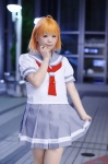 ahoge cosplay love_live!_sunshine!! naru orange_hair pleated_skirt sailor_uniform school_uniform skirt skirt_lift takami_chika rating:Safe score:0 user:nil!