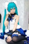 aqua_hair camisole cosplay hatsune_miku headset hizuki_yuuki project_diva_extend see-through skirt thighhighs twintails vocaloid rating:Safe score:3 user:nil!