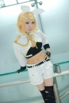 blonde_hair cosplay croptop fingerless_gloves gloves hairbow hair_clips jacket kagamine_rin onagi_mayu shorts thighhighs torn_clothes vocaloid rating:Safe score:0 user:pixymisa