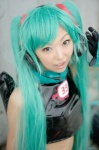 aqua_hair cosplay croptop detached_sleeves gloves hatsune_miku headset necoco project_diva twintails vocaloid rating:Safe score:0 user:nil!
