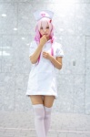 cosplay guilty_crown hiiragi_haruka nurse nurse_cap nurse_uniform pink_hair thighhighs twintails yuzuriha_inori zettai_ryouiki rating:Safe score:3 user:pixymisa