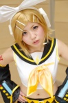 blonde_hair clinica cosplay default_costume detached_sleeves hairbow hair_clips headset kagamine_rin sailor_uniform school_uniform shorts tie vocaloid rating:Safe score:0 user:nil!
