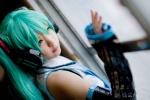 aqua_hair cosplay default_costume hatsune_miku headset kousaka_yun twintails vocaloid rating:Safe score:1 user:xkaras