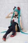 aqua_hair blouse choker cosplay hairbows hatsune_miku miniskirt skirt thighhighs twintails vocaloid world_is_mine_(vocaloid) yaya zettai_ryouiki rating:Safe score:4 user:nil!