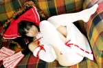 cosplay detached_sleeves hairbow hakurei_reimu lenfried miko nude thighhighs touhou rating:Questionable score:4 user:nil!