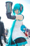 aqua_hair cosplay default_costume detached_sleeves hatsune_miku headset iori pleated_skirt skirt twintails vocaloid rating:Safe score:1 user:nil!