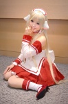 apron blonde_hair chii_(chobits) chobits cosplay kipi maid maid_uniform persocom socks rating:Safe score:0 user:darkgray