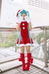 aqua_hair boots cosplay dress ear_muffs haru_mizuki hatsune_miku mittens santa_costume twintails vocaloid rating:Safe score:3 user:nil!