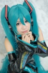 aqua_hair cosplay detached_sleeves hatsune_miku headset pleated_skirt skirt thighhighs tie twintails uta vocaloid rating:Safe score:0 user:pixymisa