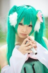 aqua_eyes bow cosplay detached_sleeves dress flower green_hair hatsune_miku headdress kai_(ii) microphone twintails vocaloid rating:Safe score:0 user:pixymisa