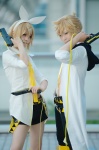 blonde_hair blouse boots cosplay crossplay dress_shirt gun hairbow hatomune hoodie kagamine_len kagamine_rin shorts souki_ryou tagme_song tie trousers vocaloid rating:Safe score:0 user:nil!