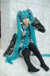 aqua_hair cosplay detached_sleeves hatsune_miku headset pleated_skirt skirt thighhighs tie twintails uta vocaloid rating:Safe score:2 user:pixymisa