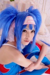 bed blue_hair bodysuit buyara cosplay hair_ribbons headband klan_klein macross macross_frontier twintails rating:Safe score:0 user:nil!