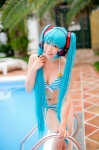 aqua_hair bikini cleavage cosplay hatsune_miku headset mashiro_yuki pool project_diva swimsuit twintails vocaloid rating:Safe score:1 user:nil!