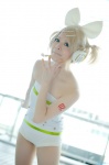 blonde_hair cosplay hairbow hair_clips headphones kagamine_rin one-piece_swimsuit pantyhose project_diva sheer_legwear swimsuit vocaloid yuyu_kaname rating:Safe score:2 user:nil!