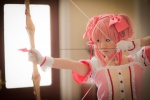 bow_(weapon) cosplay dress gloves hairbows kaname_madoka pink_hair puella_magi_madoka_magica tanaka_mana twintails rating:Safe score:3 user:shiwahentai