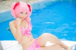 bikini_top cosplay hair_ribbons kaname_madoka mashiro_yuki miniskirt pink_hair pool puella_magi_madoka_magica skirt swimsuit twintails rating:Safe score:1 user:nil!