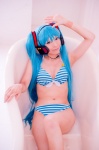 aqua_hair bathroom bathtub bikini cleavage cosplay hatsune_miku headset mashiro_yuki project_diva swimsuit twintails vocaloid rating:Safe score:0 user:nil!