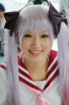cosplay hairbows hiiragi_kagami lucky_star purple_hair sailor_uniform saya school_uniform twintails rating:Safe score:0 user:nil!