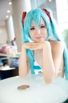 aqua_hair bikini cosplay hatsune_miku headset kishimen project_diva swimsuit twintails vocaloid rating:Safe score:0 user:pixymisa