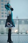 aqua_hair cosplay detached_sleeves dress hairbows hatsune_miku headset project_diva thighhighs twintails vocaloid yoppy zettai_ryouiki rating:Safe score:3 user:nil!
