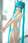 aqua_hair bikini cosplay hair_ribbons hatsune_miku headset swimsuit twintails utateika-na vocaloid rating:Safe score:1 user:pixymisa