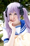 bow cosplay hairbows hiiragi_kagami hoshino_kana lucky_star purple_hair sailor_uniform school_uniform twintails rating:Safe score:0 user:pixymisa