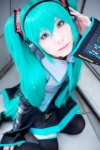 aqua_hair cosplay default_costume hatsune_miku headphones twintails vocaloid yukino_koro rating:Safe score:2 user:Log
