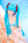 aqua_hair bikini cleavage cosplay hatsune_miku headset mashiro_yuki pool project_diva swimsuit twintails vocaloid rating:Safe score:0 user:nil!