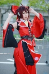 blouse boots cosplay detached_sleeves hairbow hakurei_reimu jacket nishiki red_hair skirt touhou vest rating:Safe score:1 user:nil!