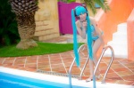aqua_hair bikini cosplay hatsune_miku headset mashiro_yuki pool project_diva swimsuit twintails vocaloid rating:Safe score:1 user:nil!