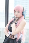 cosplay dress fingerless_gloves gloves headset megurine_luka pink_hair uni vocaloid rating:Safe score:0 user:nil!