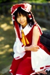 blouse cosplay detached_sleeves hairbow hakurei_reimu matsunaga_ayaka miko skirt touhou rating:Safe score:0 user:nil!