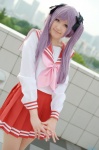 cosplay fumiko hair_ribbons hiiragi_kagami lucky_star pantyhose pleated_skirt purple_hair sailor_uniform school_uniform skirt twintails rating:Safe score:0 user:nil!