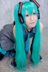 aqua_hair cosplay default_costume hatsune_miku headphones twintails uzuki vocaloid rating:Safe score:0 user:Log