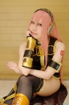 boots cosplay default_costume headset mai megurine_luka pantyhose pink_hair skirt sleeveless_blouse thighhighs vocaloid rating:Safe score:2 user:nil!