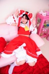 cosplay hairbow hakurei_reimu hanausagi_manyu jumper miko socks touhou rating:Safe score:0 user:LittleSweetLoli