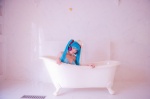 aqua_hair bathroom bathtub bikini_top cleavage cosplay hatsune_miku headset mashiro_yuki project_diva swimsuit twintails vocaloid rating:Safe score:0 user:nil!