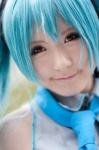aqua_hair blouse cosplay hatsune_miku headset sanaka tie twintails vocaloid rating:Safe score:1 user:pixymisa