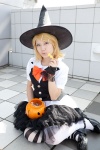 blonde_hair blouse bow cosplay kagamine_rin kurage_zakuro petticoat skirt thighhighs trick_and_treat_(vocaloid) vest vocaloid witch_hat rating:Safe score:0 user:pixymisa