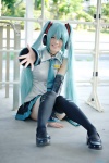 aqua_hair blouse cosplay detached_sleeves hatsune_miku headset pleated_skirt popuri skirt thighhighs tie twintails vocaloid zettai_ryouiki rating:Safe score:2 user:nil!