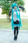 aice aqua_hair cosplay default_costume detached_sleeves hatsune_miku headset pleated_skirt skirt thighhighs tie twintails vocaloid zettai_ryouiki rating:Safe score:0 user:nil!