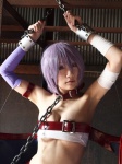 bandages belt_bra cleavage collar cosplay handcuffs leash lilith_aensland mitsuki_riyu purple_hair sarashi shadow_(milneige) vampire_(game) wings rating:Safe score:2 user:nil!