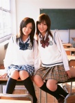 bow classroom costume desks kneesocks miniskirt otomo_sayuri plaid pleated_skirt school_uniform skirt sweater_vest tatsumi_natsuko rating:Safe score:1 user:nil!