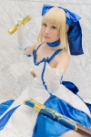 blonde_hair choker cosplay dress elbow_gloves fate/series fate/stay_night gloves hairbow hazuki_minami saber sword thighhighs rating:Safe score:0 user:pixymisa