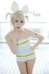 blonde_hair cosplay hairbow hair_clips headphones kagamine_rin one-piece_swimsuit project_diva swimsuit vocaloid yuyu_kaname rating:Safe score:1 user:nil!