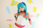 aqua_hair camisole cosplay hatsune_miku headset miniskirt necoco remix_necosmo skirt tagme_song twintails vocaloid rating:Safe score:0 user:nil!